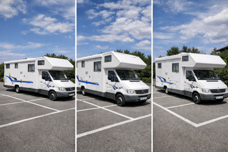 Ein weißes Wohnmobil mit blauen und gelben Streifen parkt auf einem asphaltierten Parkplatz. Die Markise ist vollständig ausgefahren und reicht über die Begrenzungslinie in die benachbarte Stellfläche